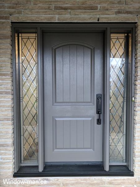 Fiberglass front door ideas. Entry insulated exterior. Two sidelights. Cooks town Custom decorative stained glass. Windswept smoke